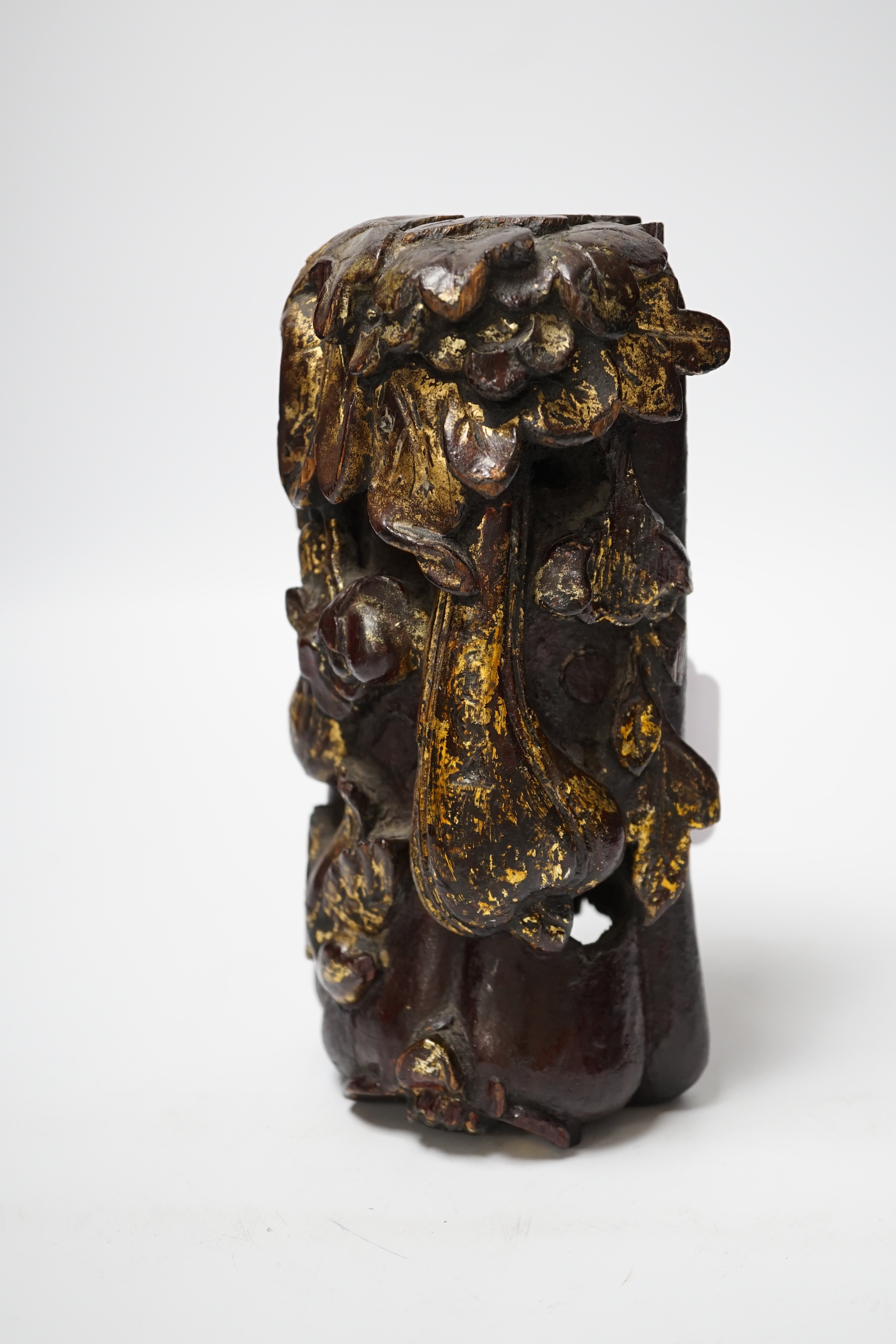 A Chinese lacquered wood fruit carving, late Qing dynasty, 20cm high